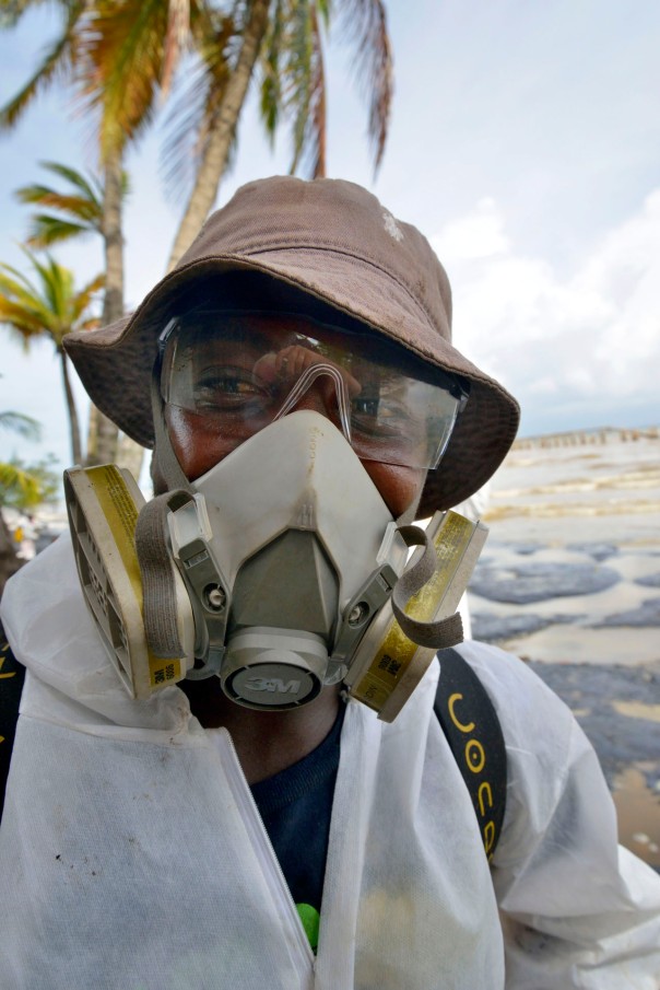 Trinidad, 2014, Gulf of Paria, Shoreline clean-up from Petrotrin Oil-Spill with Protective clothing